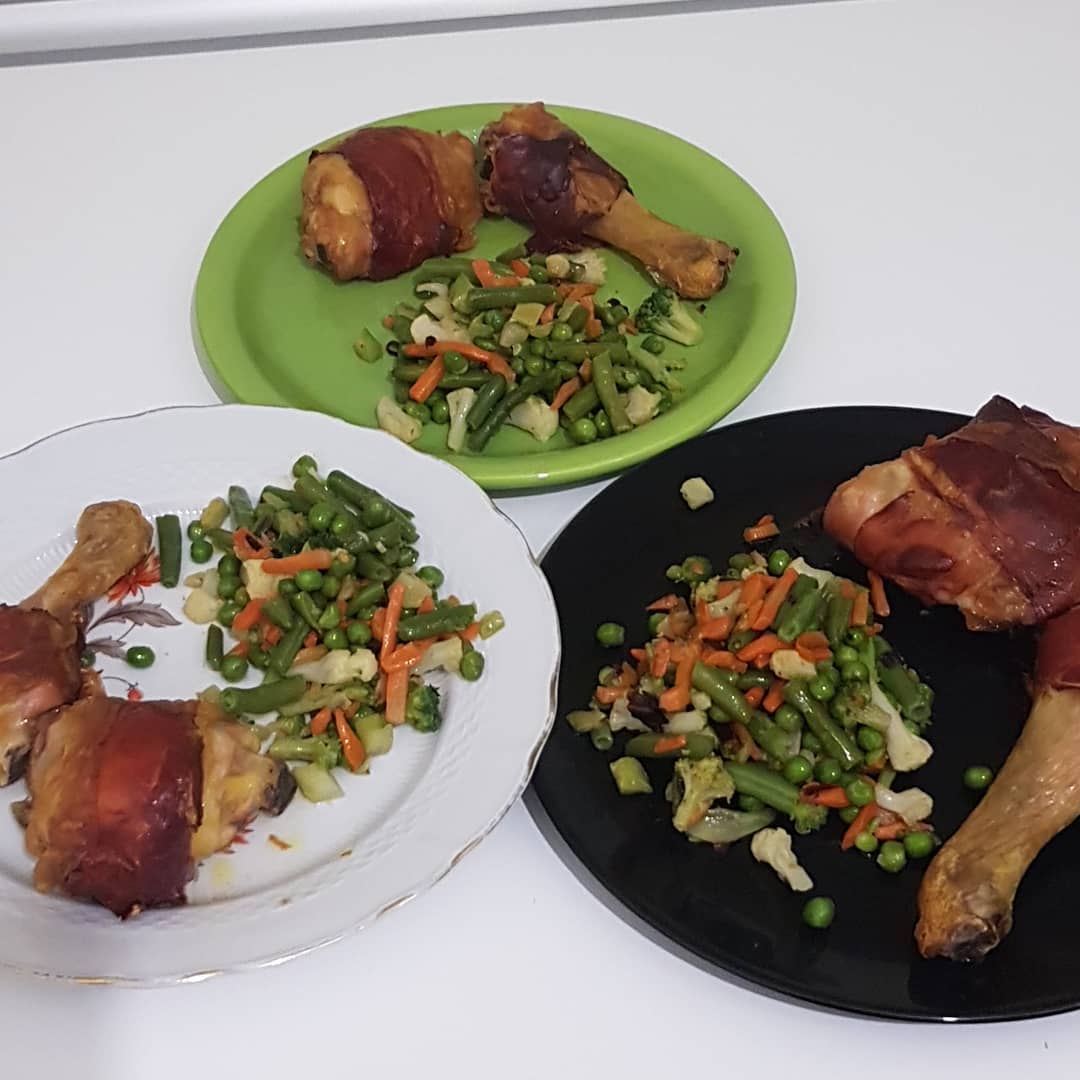 Chicken wrapped in panchetta with veggies with a little bit