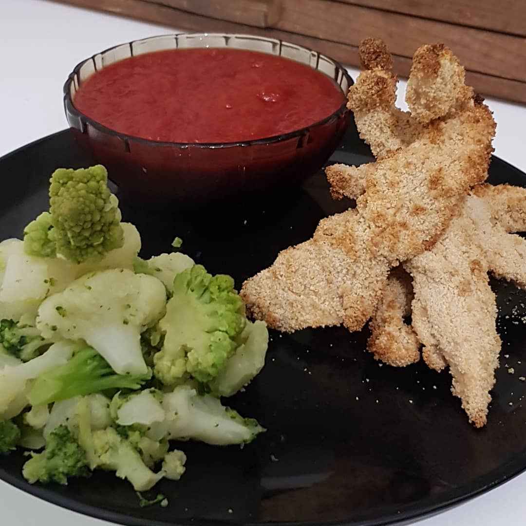 Oven baked chicken fingers with breadcrumb / milk mix and