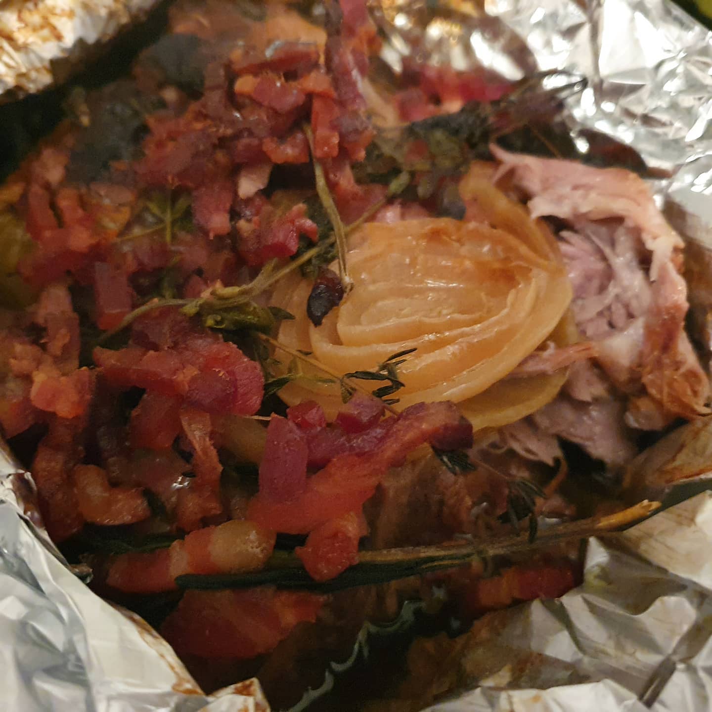 8 hours slow cooking pork with bacon, sage, rosmarin and