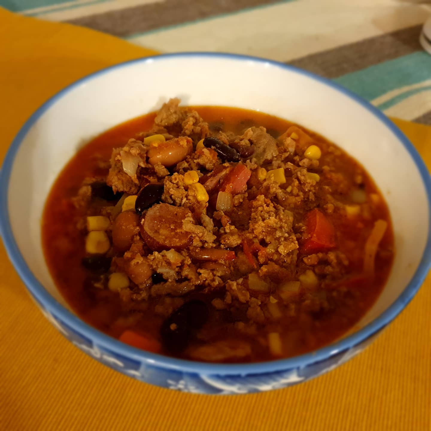 Some sort of chilly con carne with onion, carrot, bell