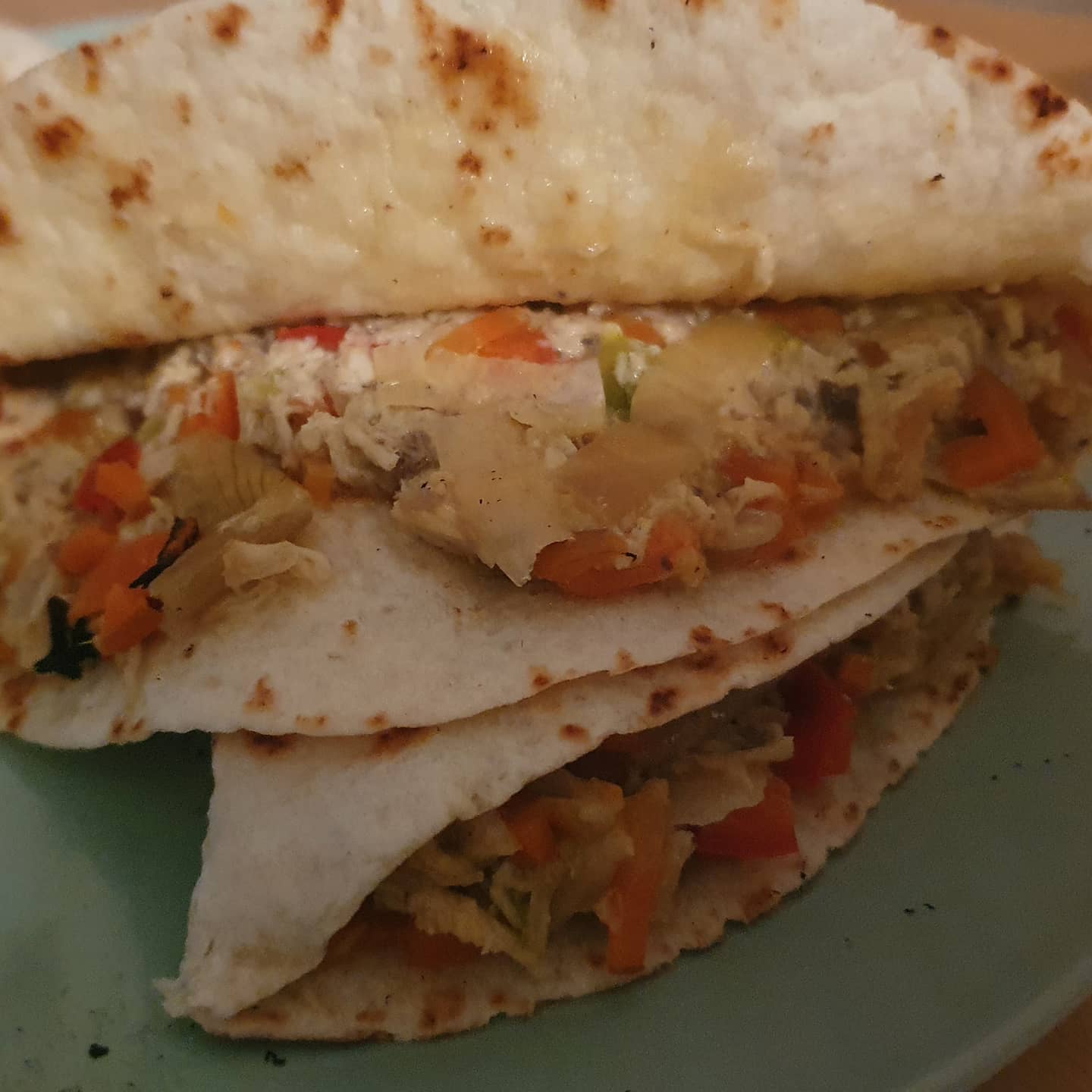 Toddler tortilla with chicken, carrot, bell pepper, zucchini, onion and